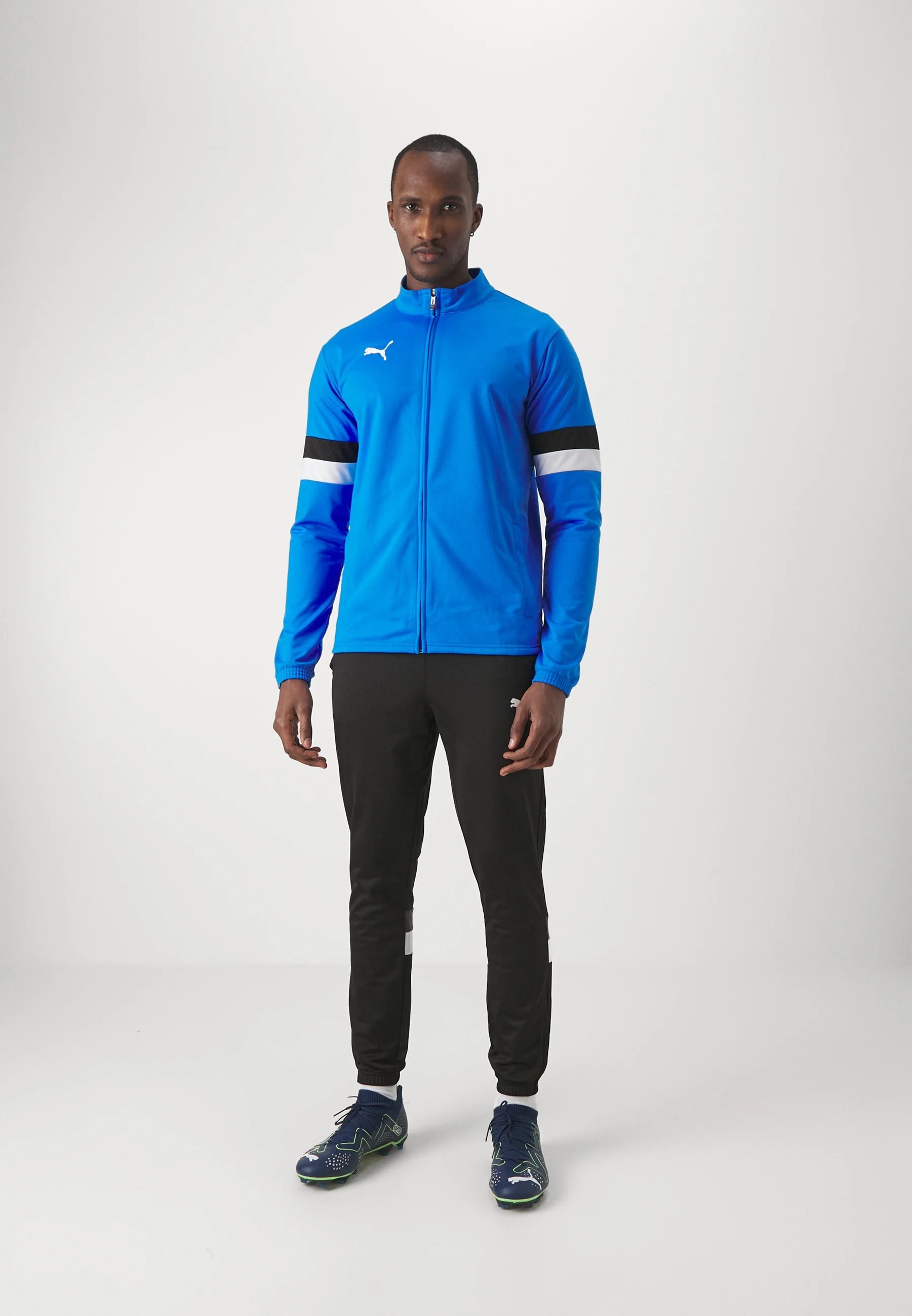 TUTA COMPLETA PUMA TEAMRISE 658653-02        100% poliestere riciclato